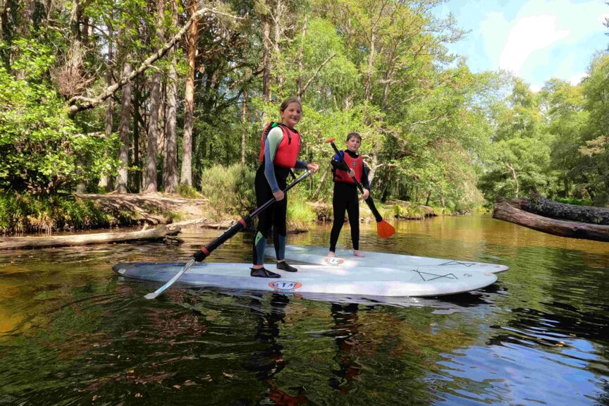 Paddleboarding on river
